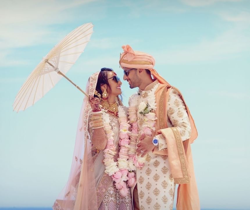 South Asian wedding couple near Ocean Place Resort & Spa