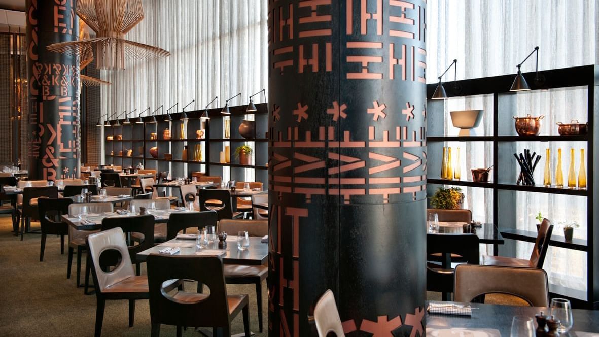 Interior with table setup in a restaurant at Crown Hotels