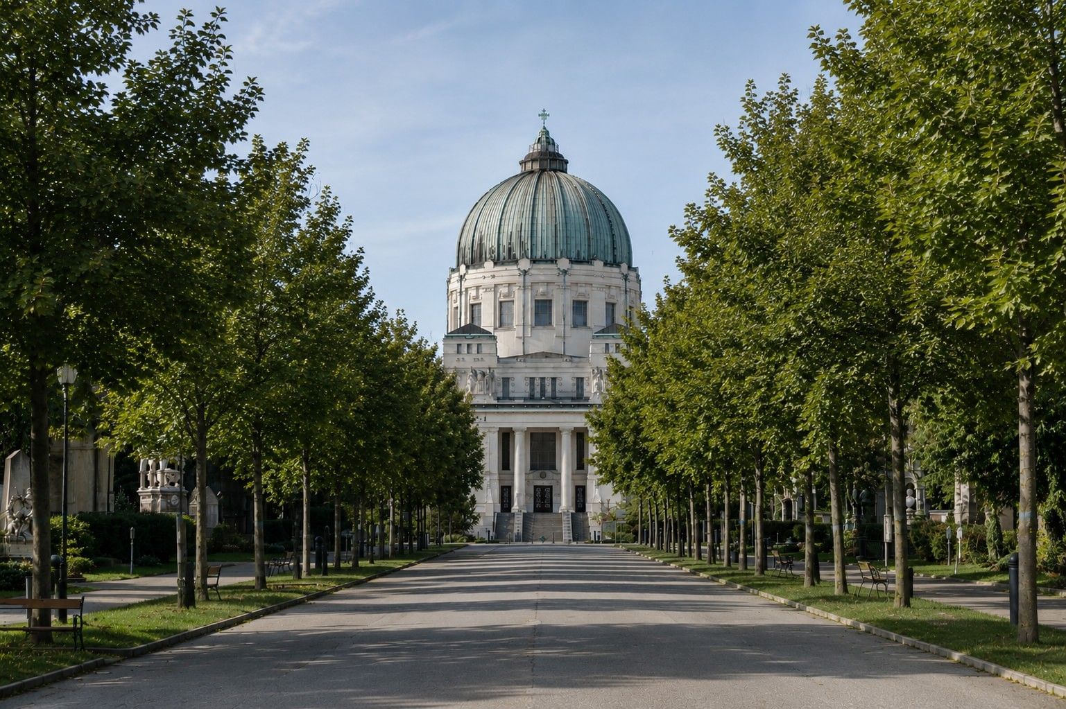 Vienna Central Cemetery with tree lined avenue and view of St Charles Borromeo Church