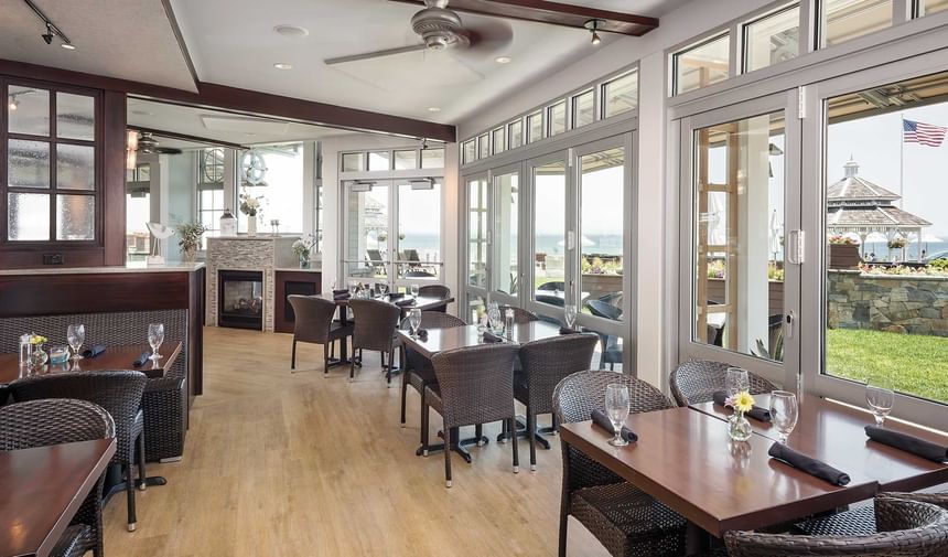 Indoor dining & lounge area overlooking the sea at Ogunquit Collection