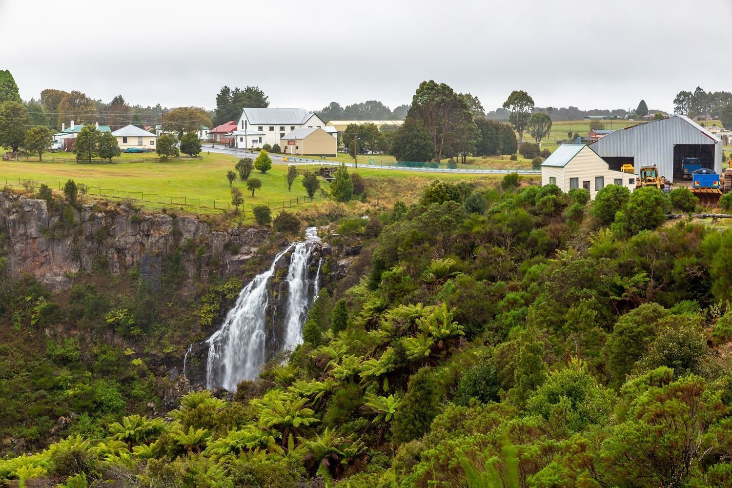 Waterfall with a city view near Strahan Village