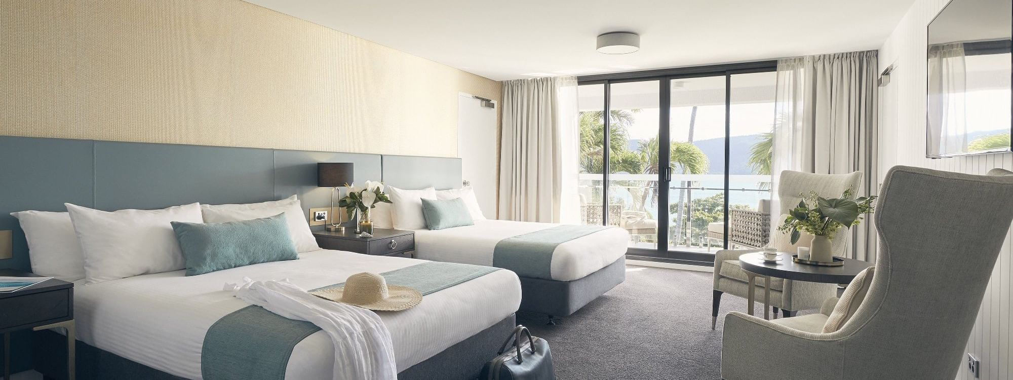 Two beds in Deluxe Serenity Twin room at Daydream Island Resort