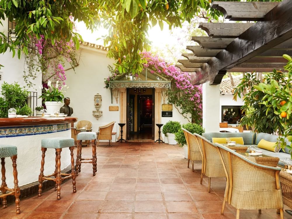 Outdoor bar area & lounge at Marbella Club Hotel