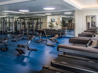 Interior view of fully equipped gym at Palazzo Versace Dubai
