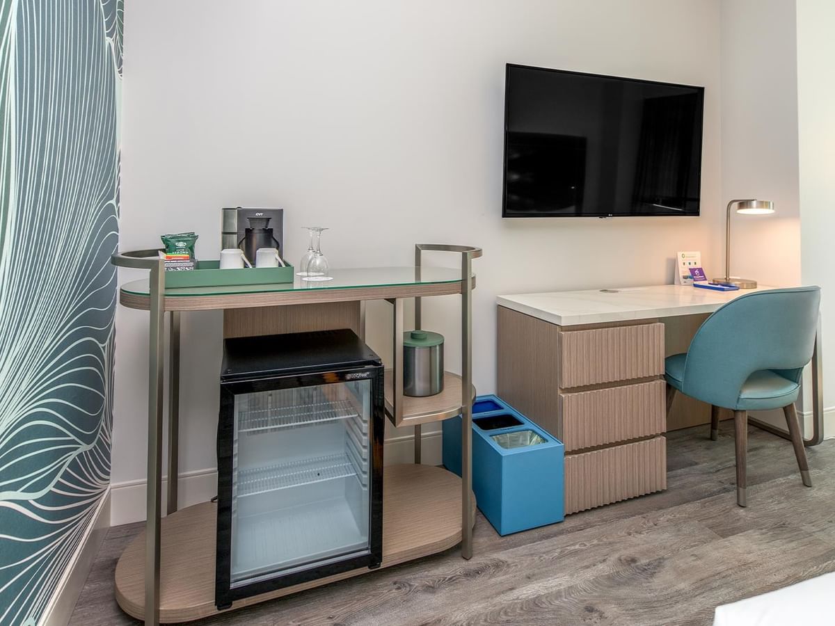 TV, desk and chair in an accessible room.