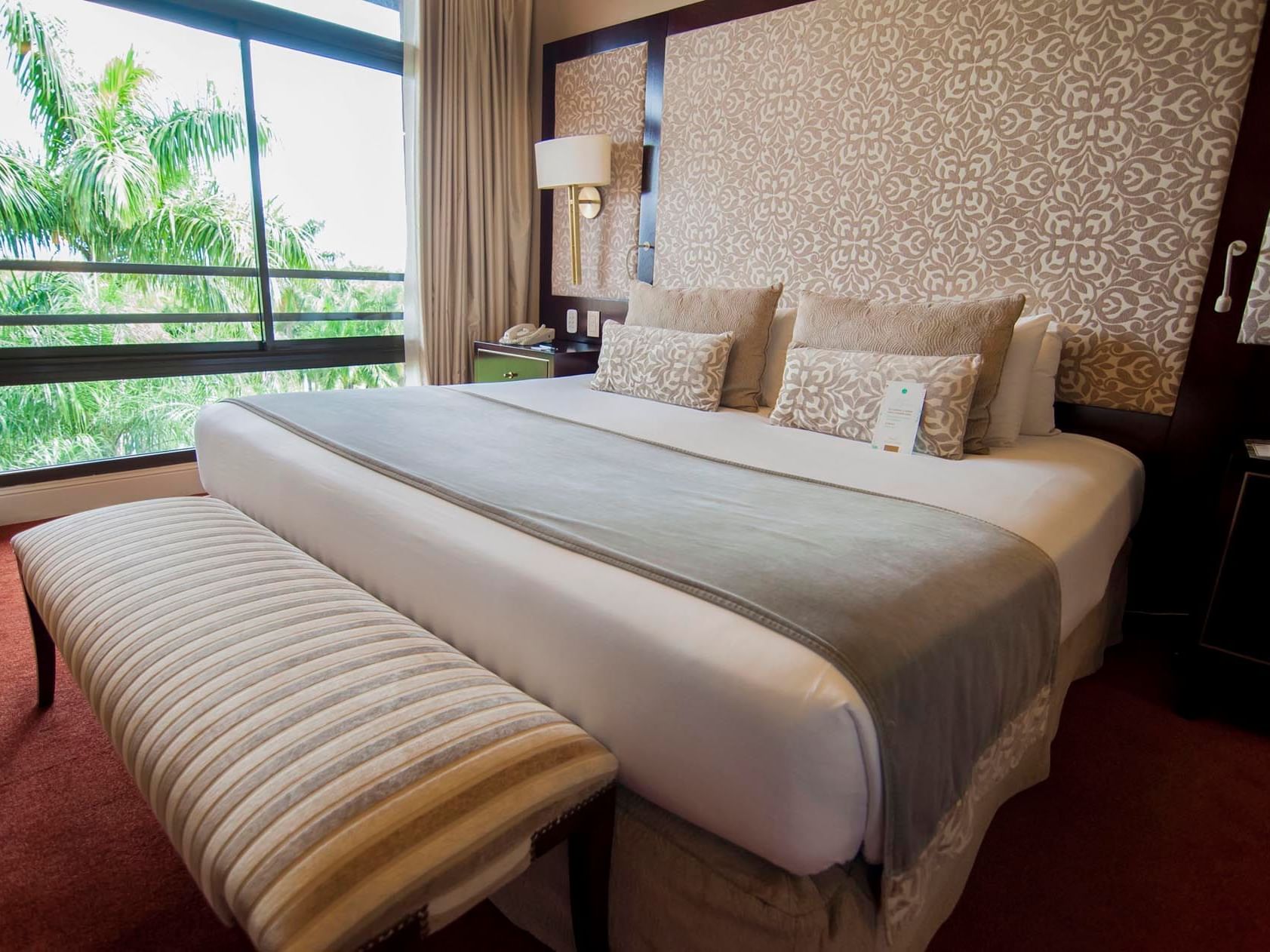 King bed in Executive Suite room at Iguazu Grand Resort
