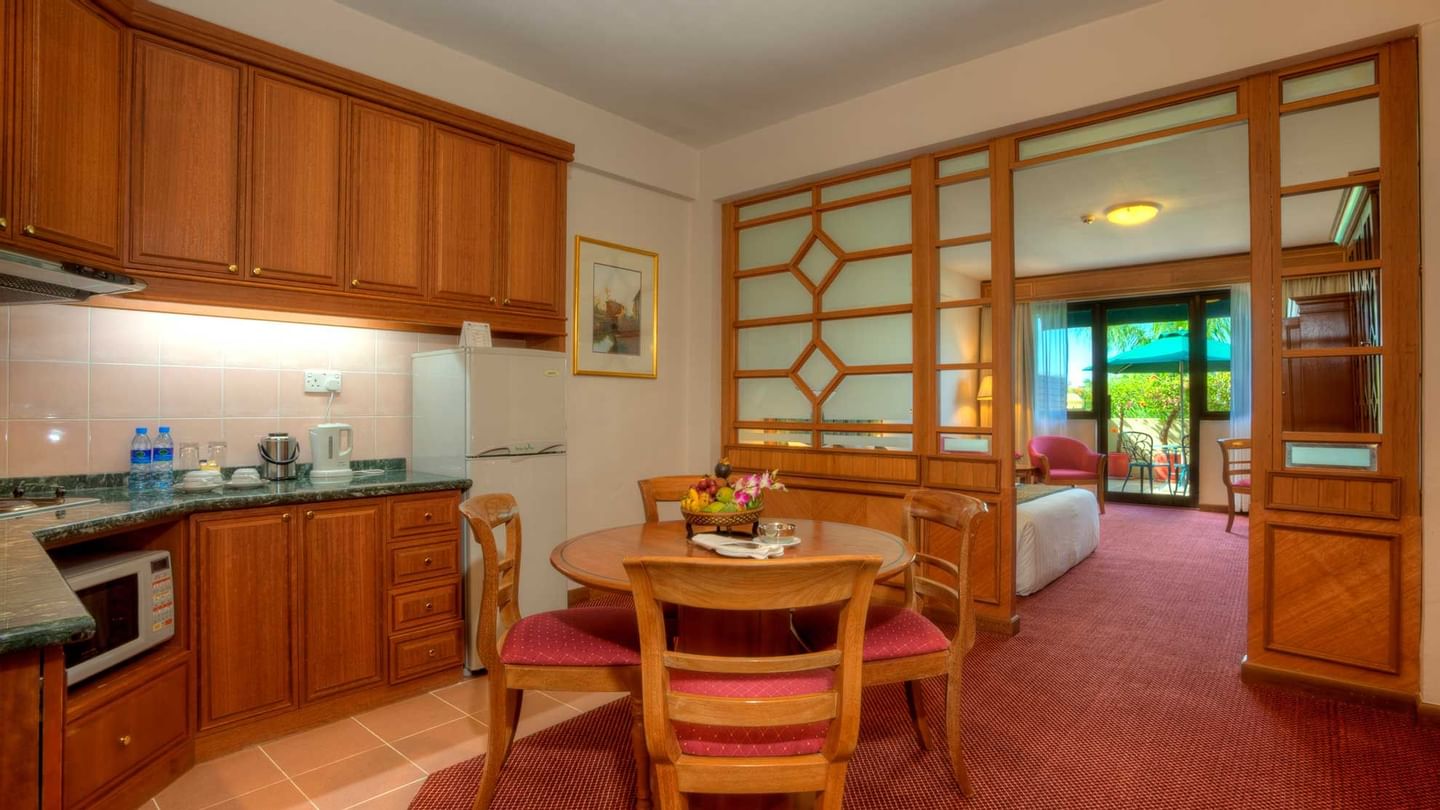 Wall-mounted water dispenser with a bottle in Deluxe Plus King at Sunway Hotel Big Box