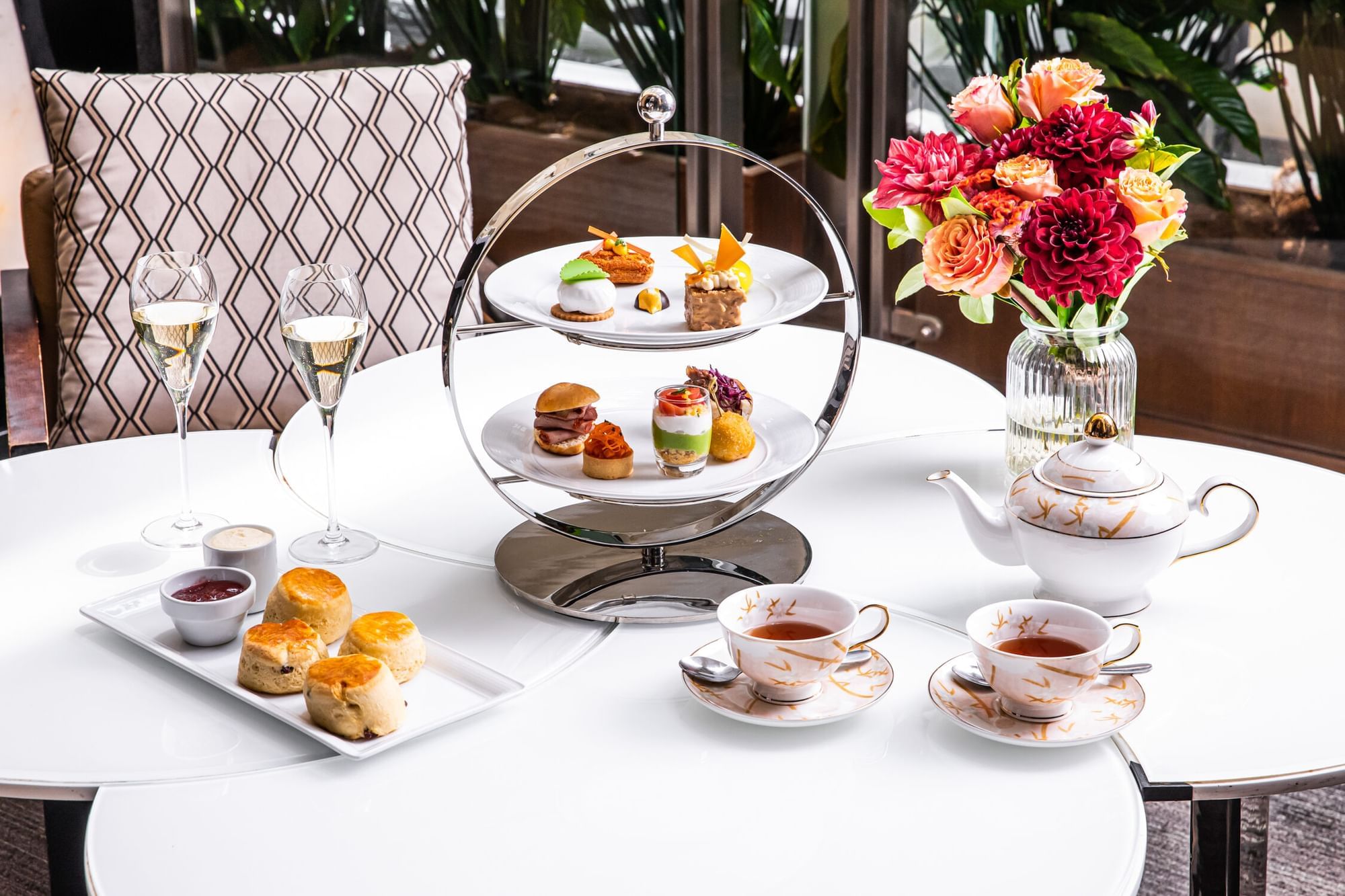 High tea platter with four assorted desserts served at Fullerton Group