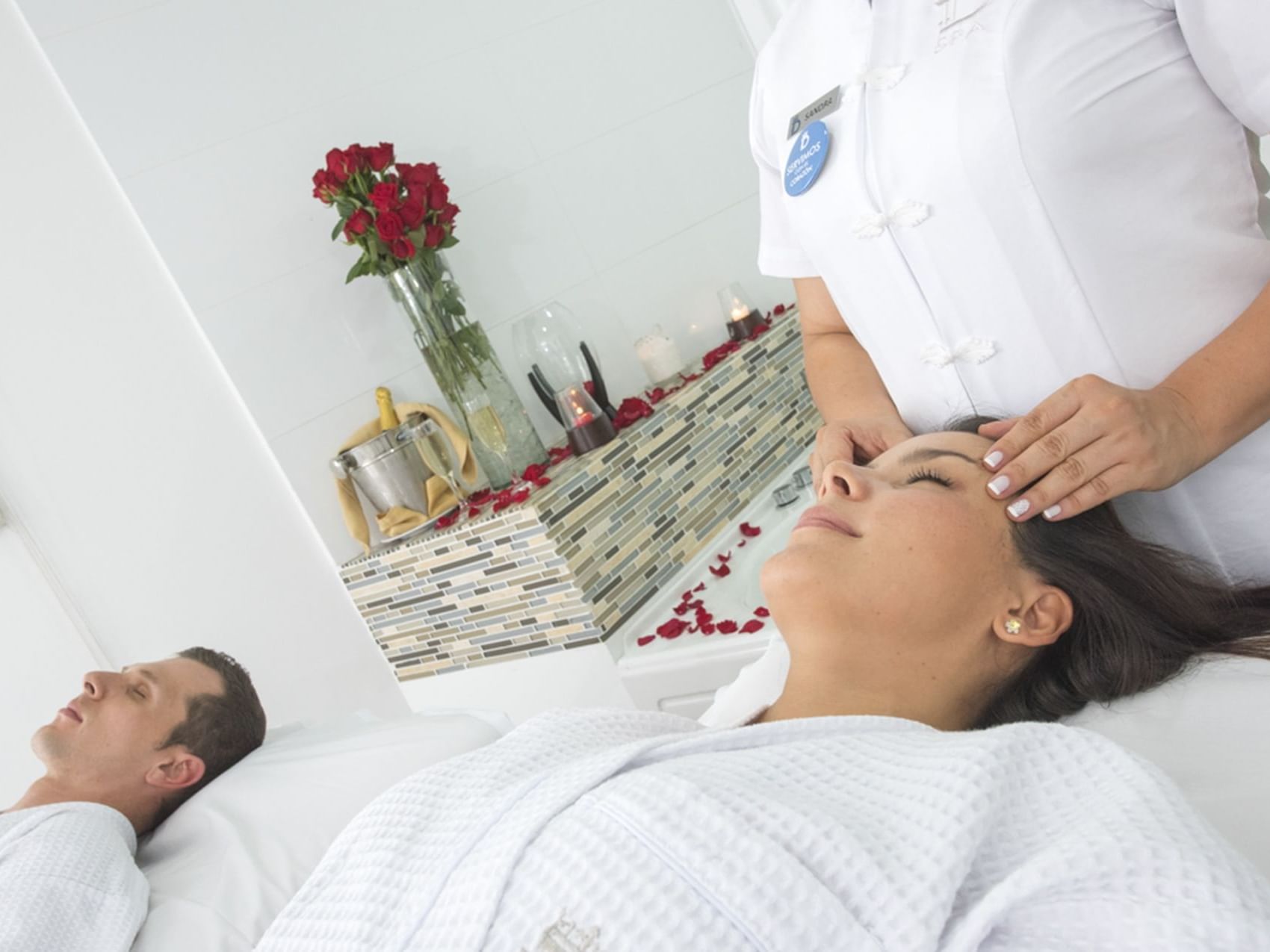 A lady receiving a head massage in the Spa at Hotel Dann Carlton Medellin