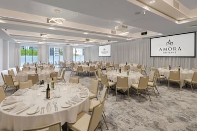 Well-arranged tables in meeting room at Amora Hotel Brisbane
