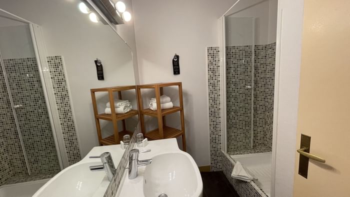 Bathroom vanity in bedrooms at Hotel Napoleon