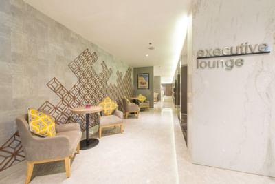 Executive lobby lounge area with comfy chairs at Eastin Grand Hotel Saigon