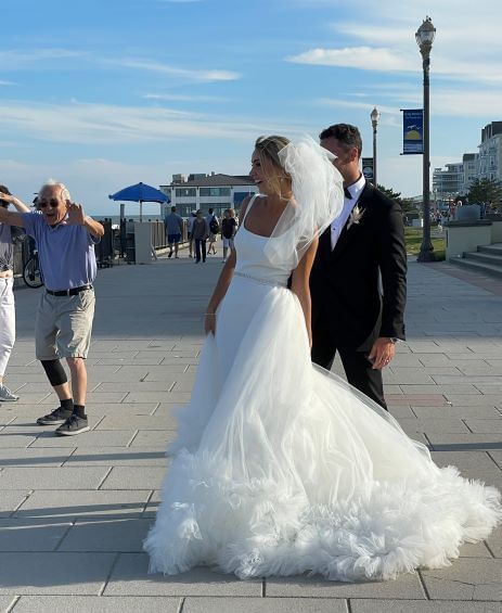 A bride with the groom outside at Ocean Place Resort & Spa