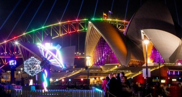 Crowds enjoying the KA3323 light installation at the Royal Botanic Garden Sydney precinct during Vivid Sydney 2019.