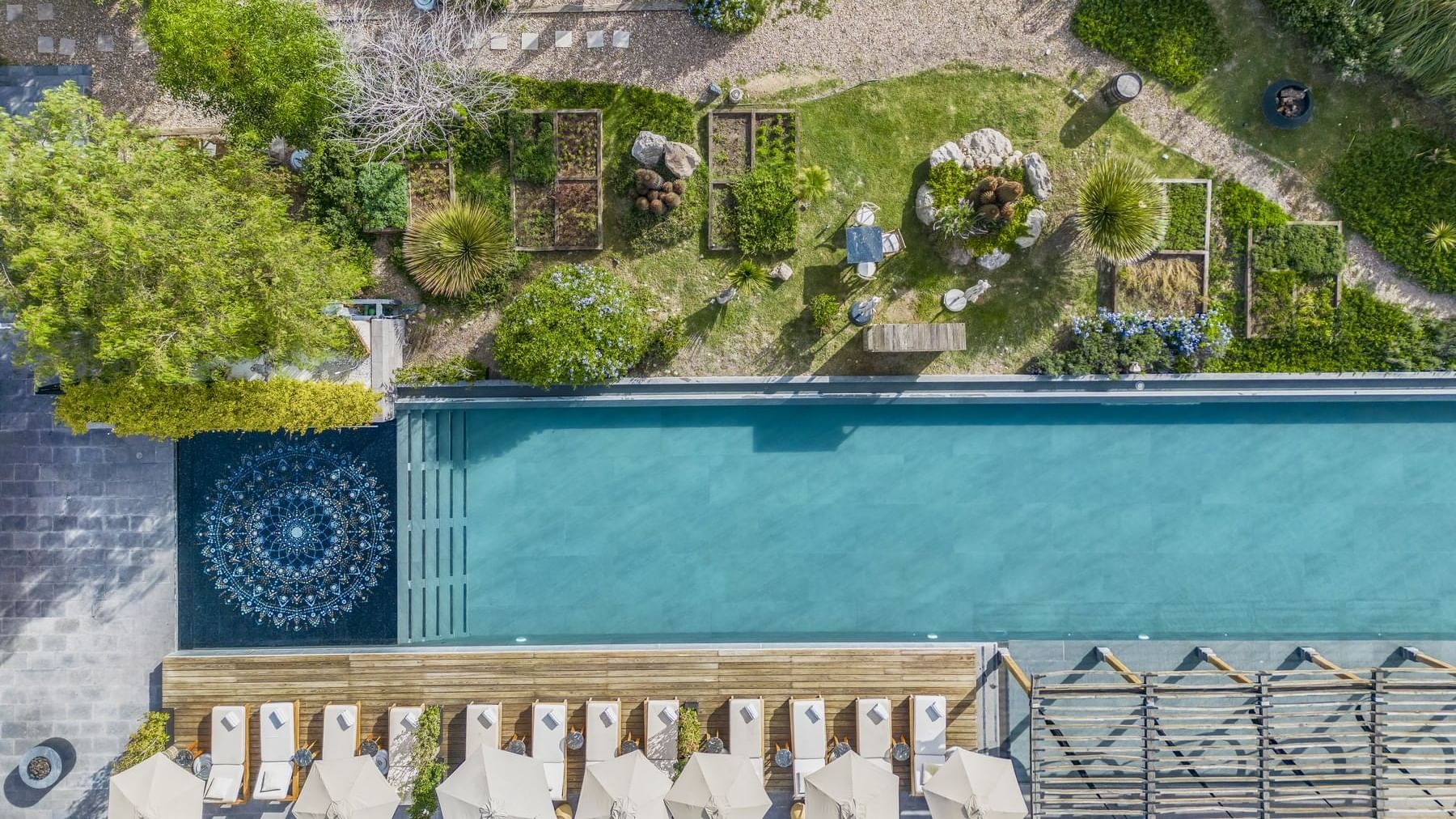 Drone shot of the hotel exterior & pool area at Live Aqua San Miguel de Allende
