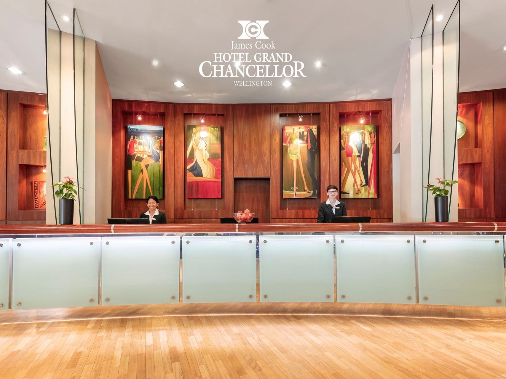 Receptionists by the aesthetic lobby front desk at James Cook Grand Chancellor