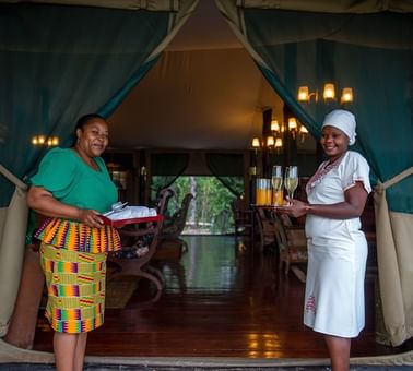 Two women in the spa entrance at Kirawira Serena Camp