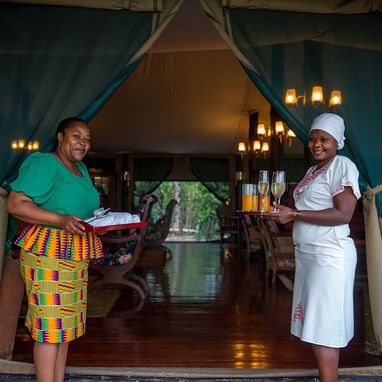 Two women in the spa entrance at Kirawira Serena Camp