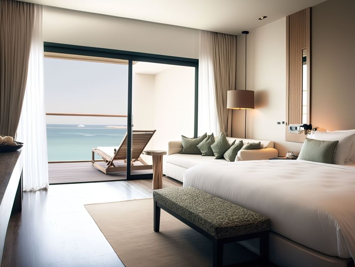 Ocean View suite with a king bed, balcony and beach view