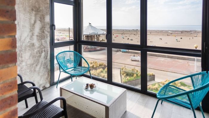 Lounge with beach view in Hotel Neptune at The Originals Hotels