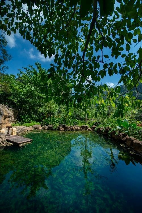 Landscape view of the geothermal pool at The Banjaran Hotsprings Retreat