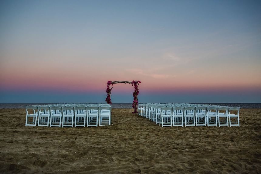 Outdoor wedding ceremony arranged on a beach at Ocean Place