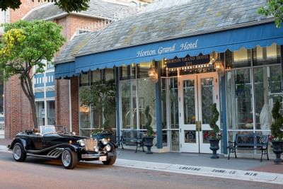 Vintage car by the entrance of Horton Grand Hotel