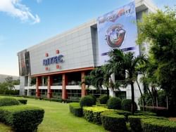 Exterior view of BITEC building near Hop Inn Hotel