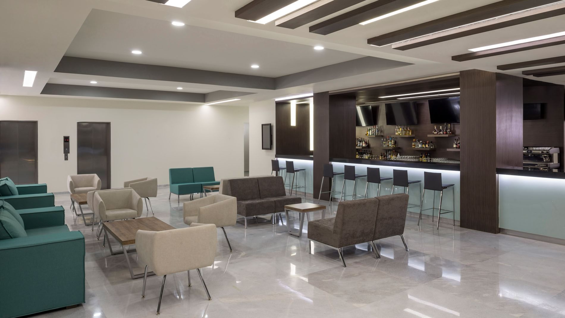 Sleek Lobby Bar with contemporary lounge seating, bar stools, and a minimalist design at Real Inn Celaya