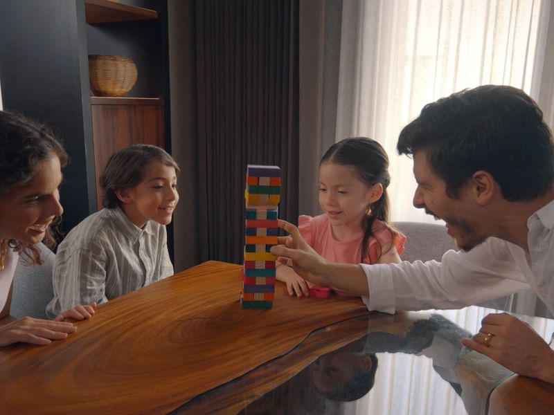 Family playing with building blocks at Grand Fiesta Americana Hotel and Resorts