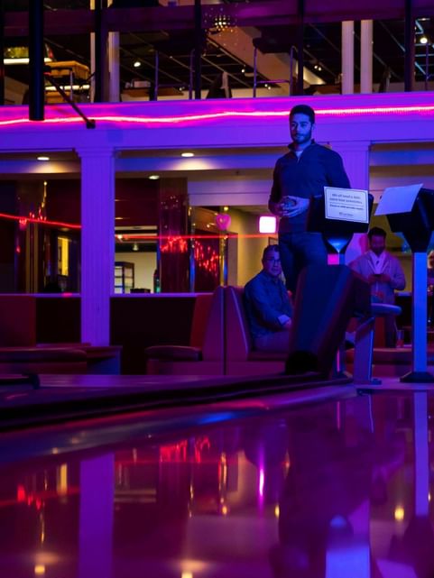 People gathered for a Bowling Alley, featuring Top Indoor Activities for Couples at Cove Pocono Resorts
