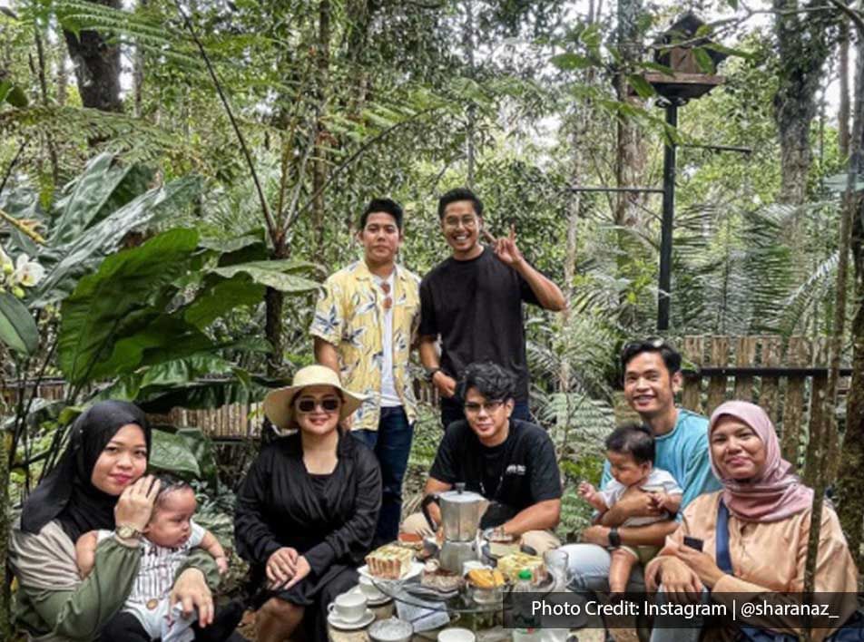 A group of people were taking a picture together at Kopi Hutan - Lexis Suites Penang