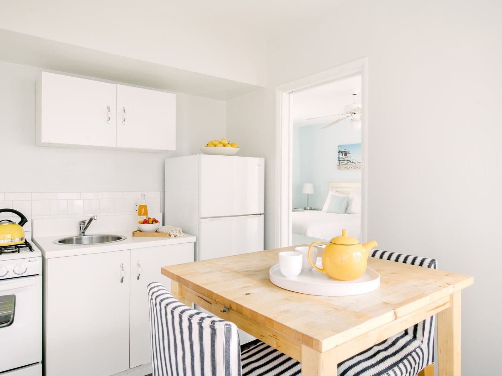 a dining table in a kitchen