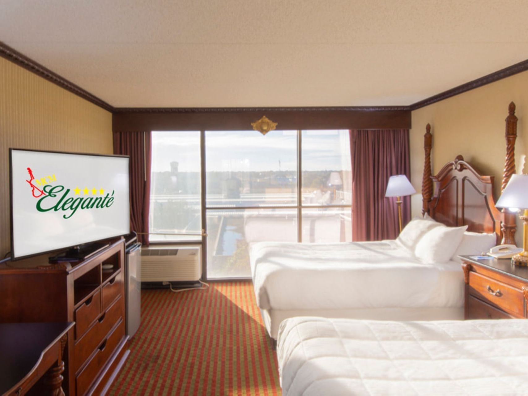 Interior of Standard Double Queen room at MCM Elegante Hotel O.