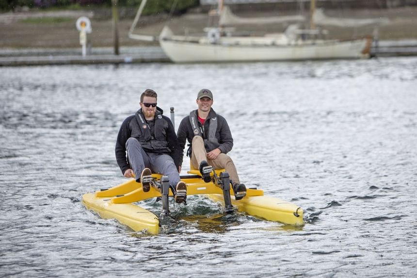 2 men on a sea cycle near Alderbrook Resort & Spa