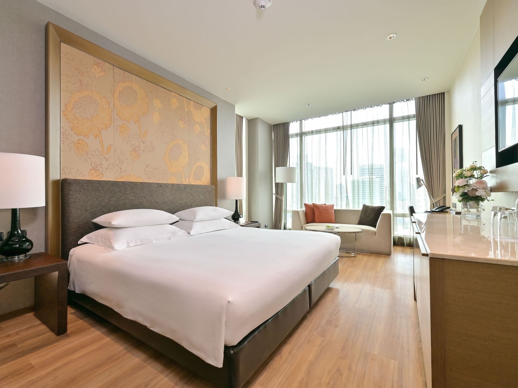 Comfy bed with sofa in Executive Deluxe with Lounge access at Eastin Grand Hotel Sathorn