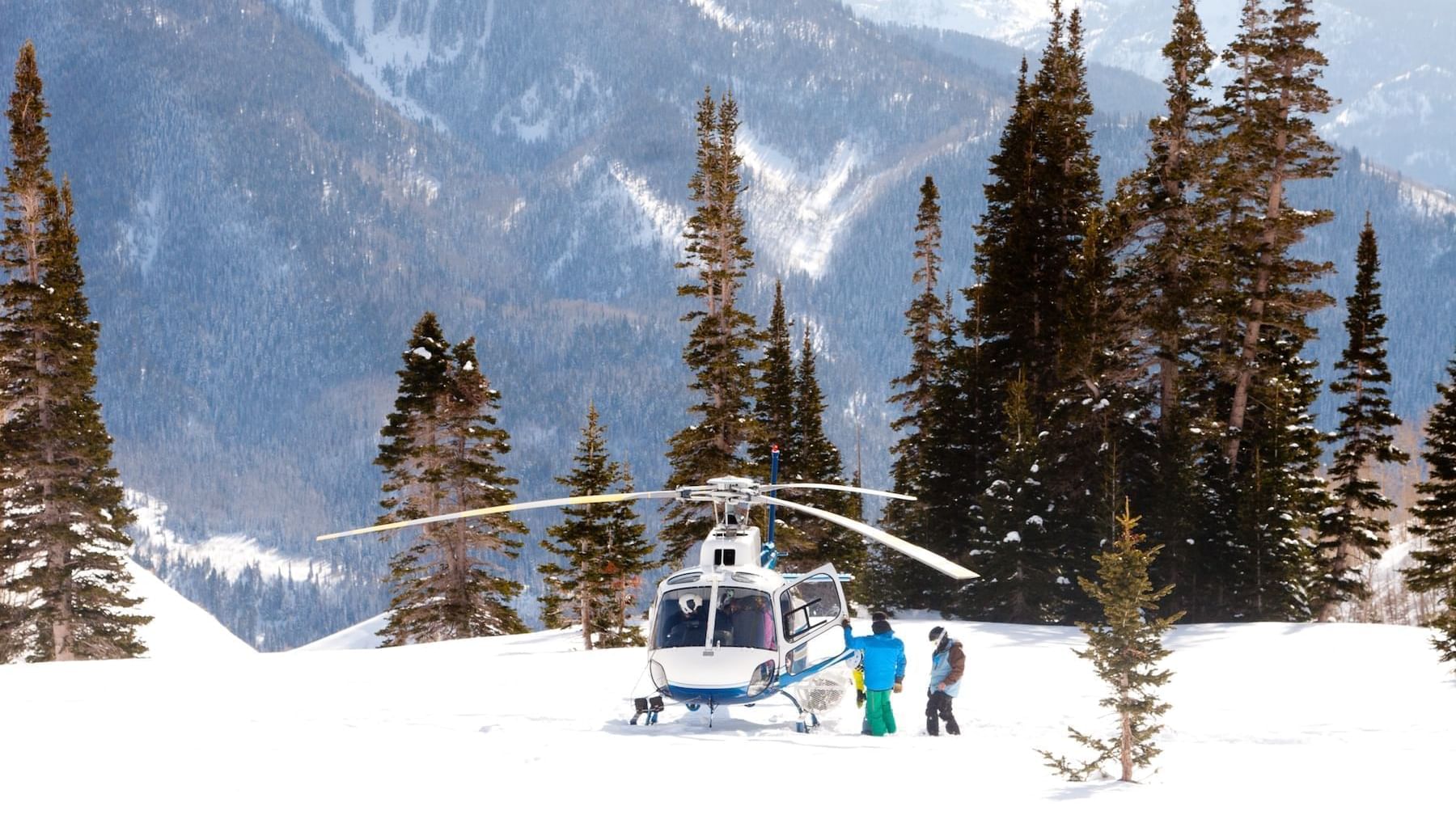 Helicopter on snowy mountain