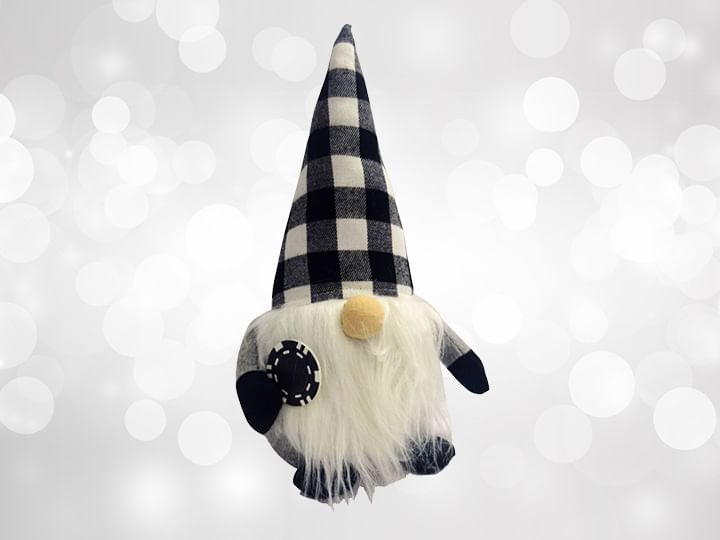 Gnome with beard wearing a pointy hat and holding a casino chip
