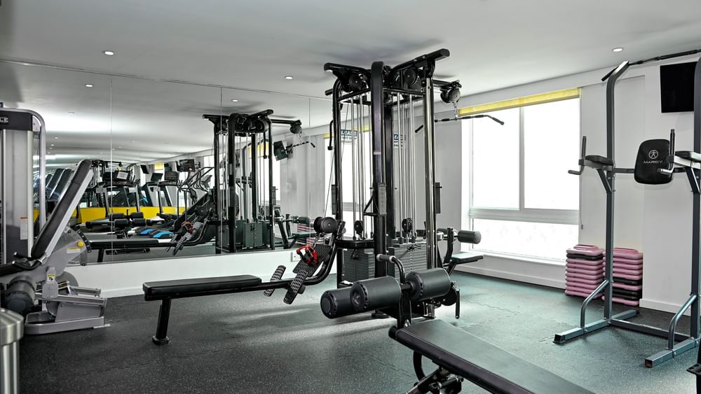 Well-equipped gym with modern machines and free weights at Warwick Paradise Island - Bahamas in Nassau.