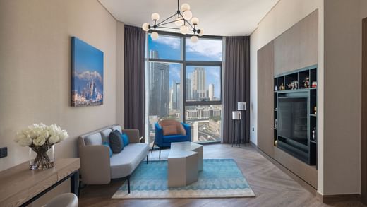 Living area of Co-Star Suite with city view at Paramount Hotel Midtown