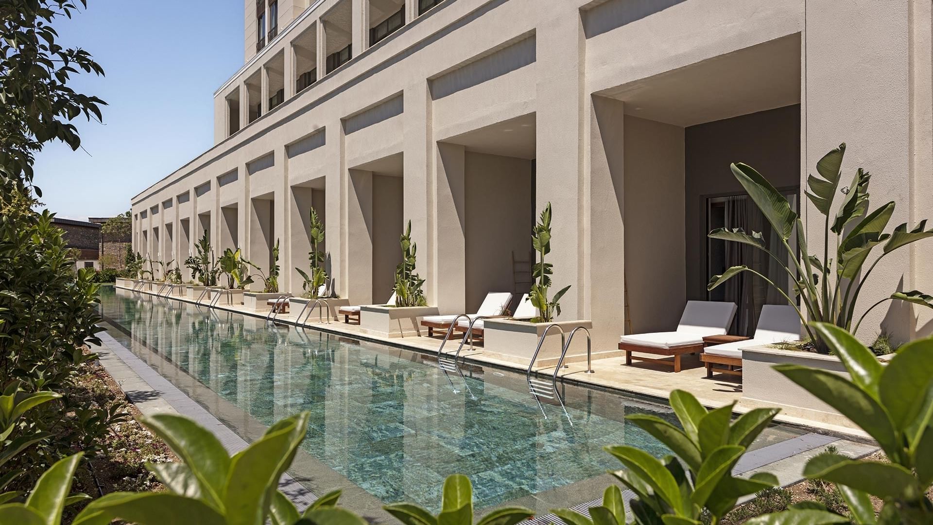 Sun loungers by the pool at Superior Room Swim-up in Cullinan Belek