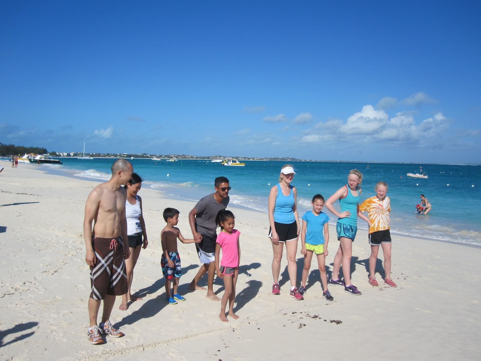 People at the beach near The Somerset on Grace Bay