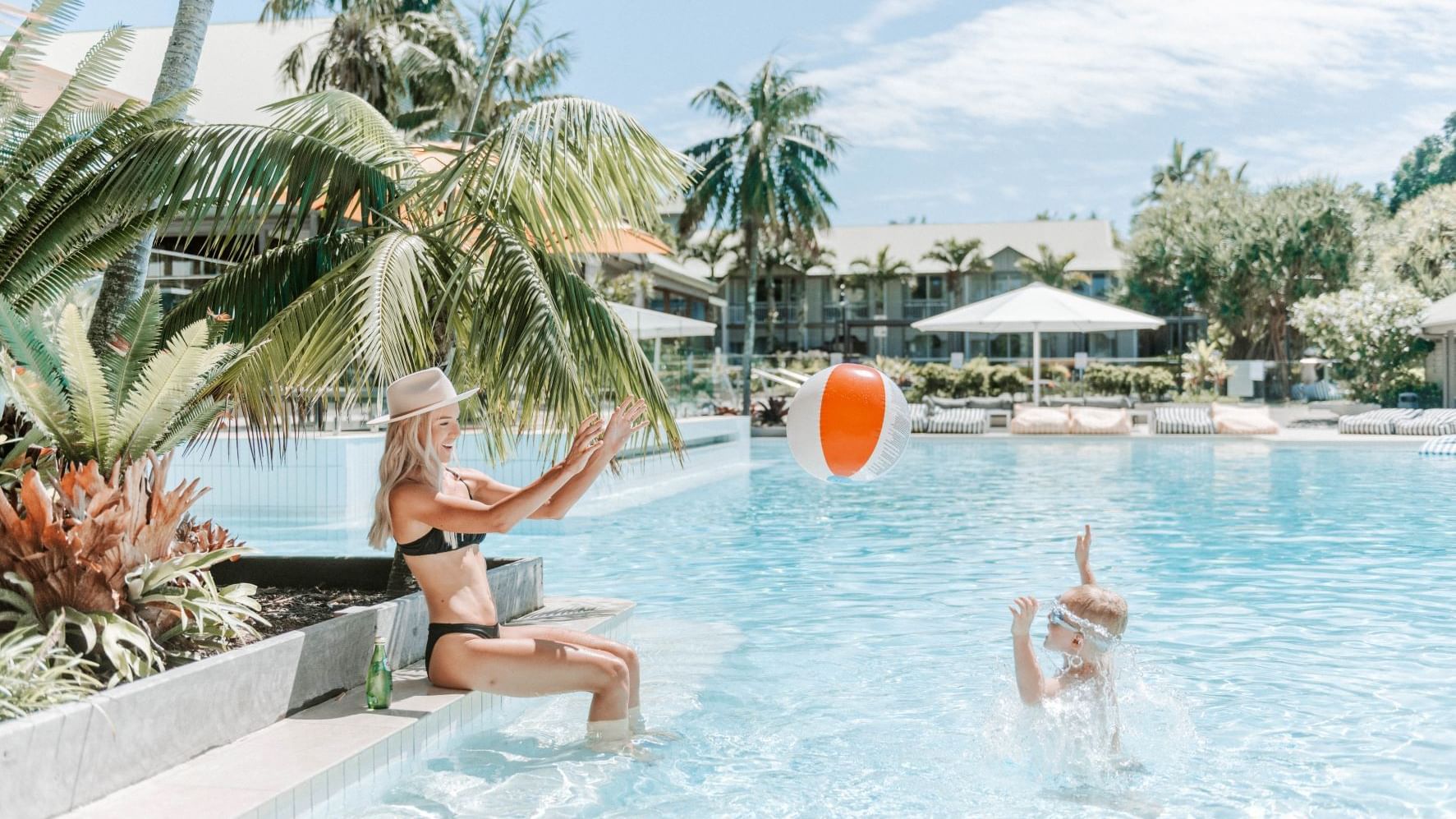 Novotel Sunshine Coast Resort swimming pool with mother and son playing