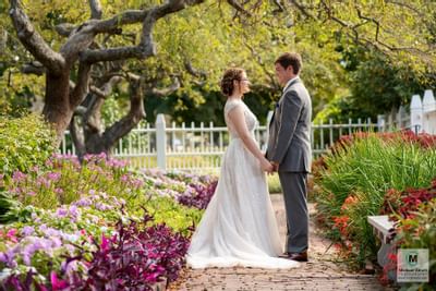 Couple Posing with holding their hands at The Venue at Portwalk