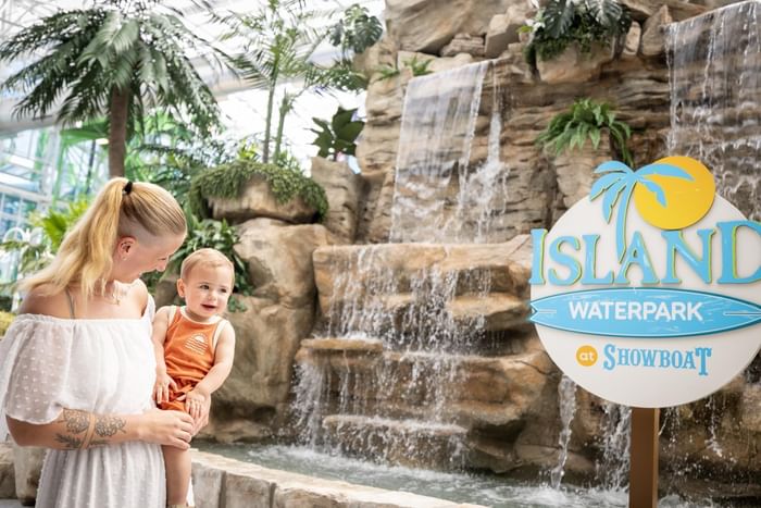 Baby and his mother posing near Island Waterpark at Showboat