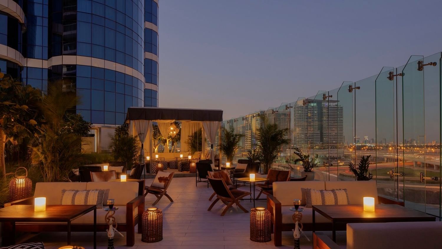 Illuminated terrace lounge area in Malibu Deck at Paramount Hotel Dubai