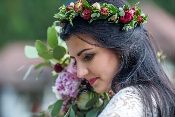 Bride wearing floral crown, a unique wedding veil alternative