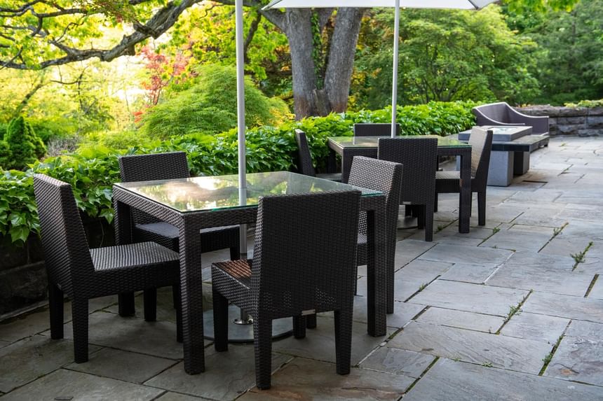 Outdoor dining area with garden at Castle Hotel and Spa