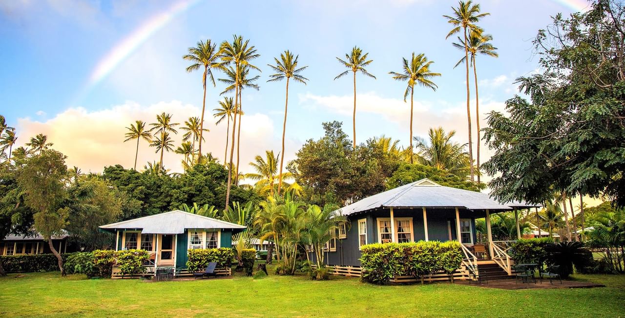 rainbow above cottages