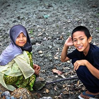 Kids playing by the beach of penang